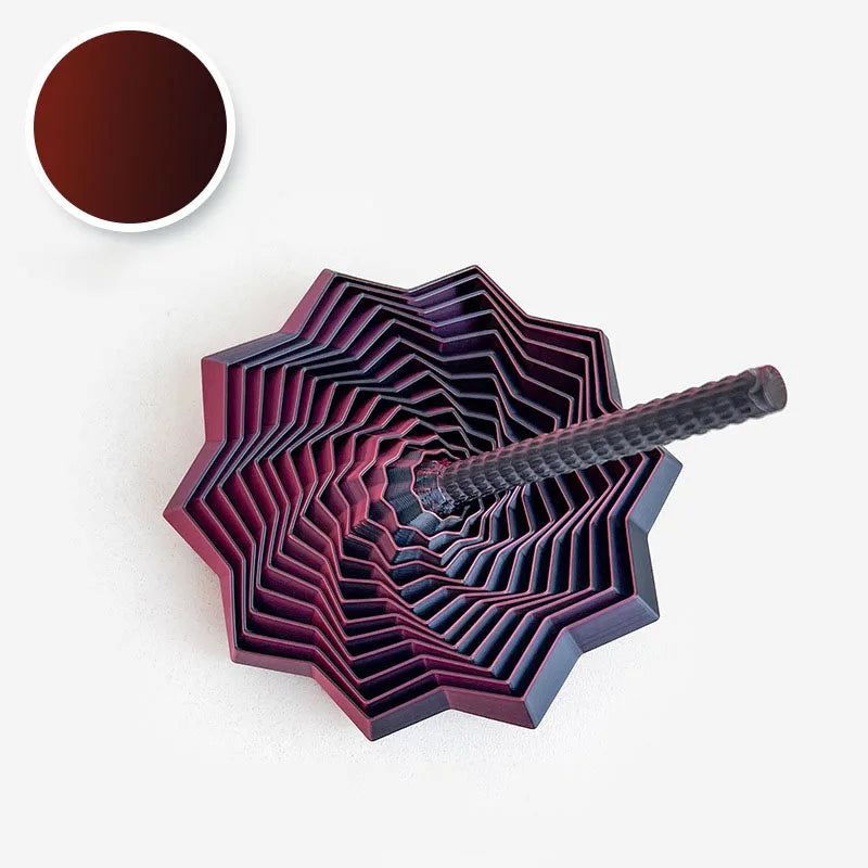A dark purple 3D illusion fidget star with a swirling spiral design and a black textured handle.