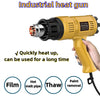 A yellow industrial heat gun with a black body and multiple nozzles is shown, demonstrating its use for film, pipe, and paint