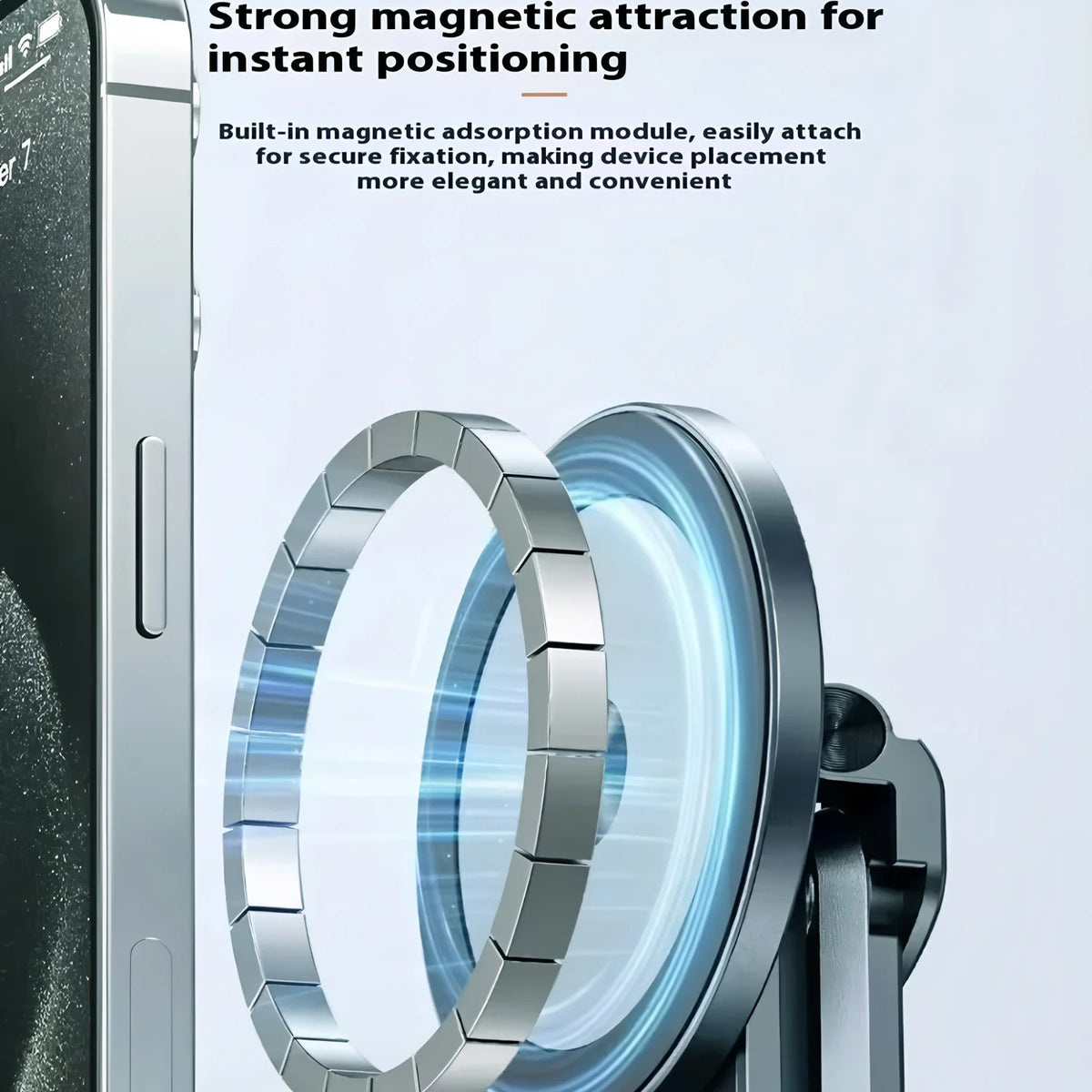 Close-up of a silver magnetic phone holder accessory with two circular rings, demonstrating strong magnetic attraction for de