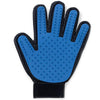 A blue silicone pet grooming glove with a black cuff and textured fingertips for hair removal.