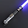 A metallic lightsaber hilt with a glowing blue blade is shown against a dark background.
