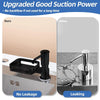 A black built-in kitchen sink soap dispenser with a sponge holder and a silver faucet, demonstrating no leakage.