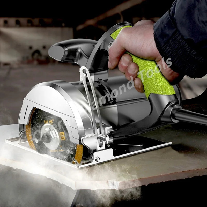 A hand is operating a silver turbo diamond saw blade on a piece of tile or stone.