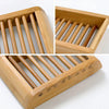 A wooden bamboo soap dish with multiple drainage slats shown from different angles.
