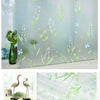 Frosted privacy window film featuring a delicate white and blue floral stripe pattern on glass