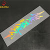 A motorcycle helmet sticker featuring wildstyle graffiti lettering in neon colors on a gray background.