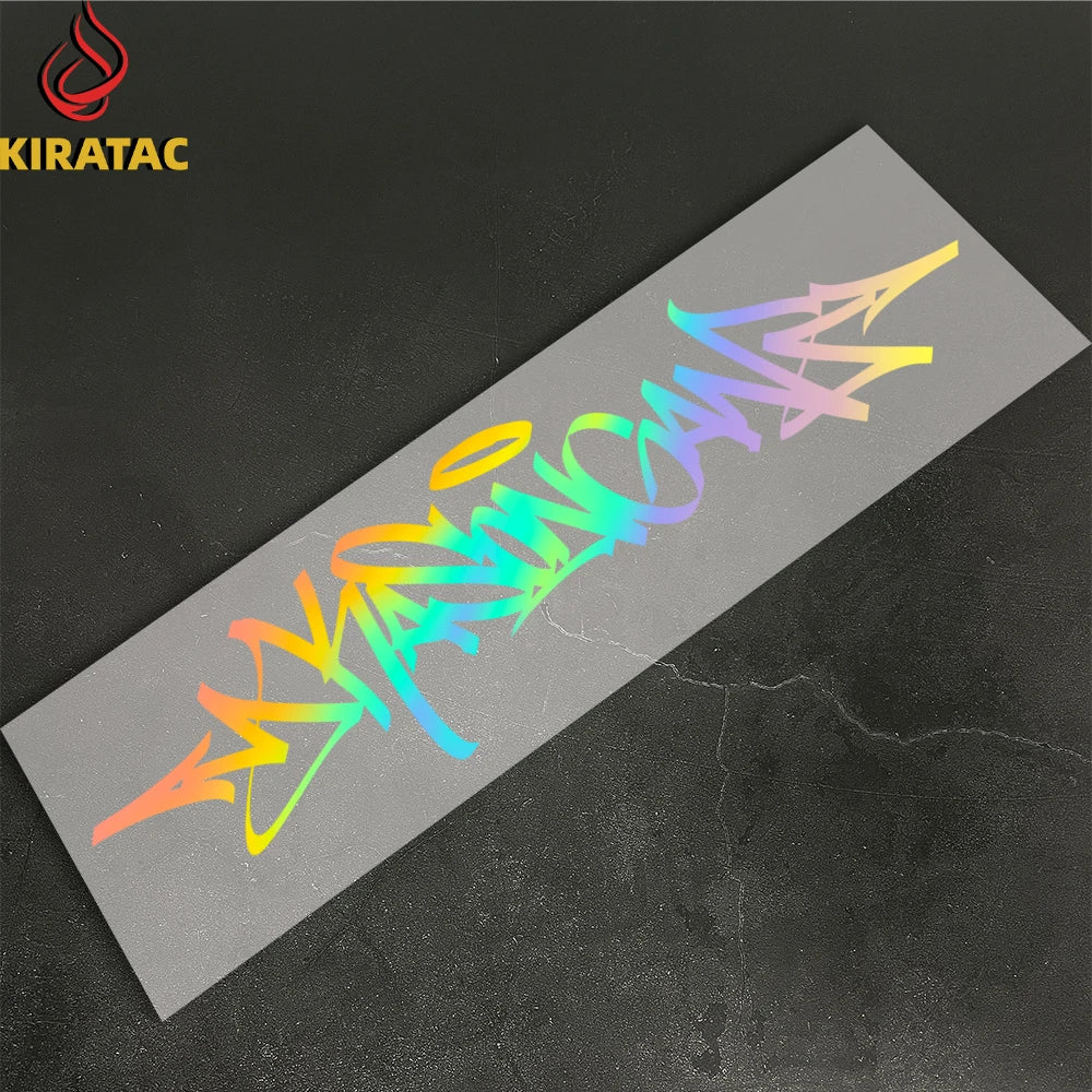 A motorcycle helmet sticker featuring wildstyle graffiti lettering in neon colors on a gray background.