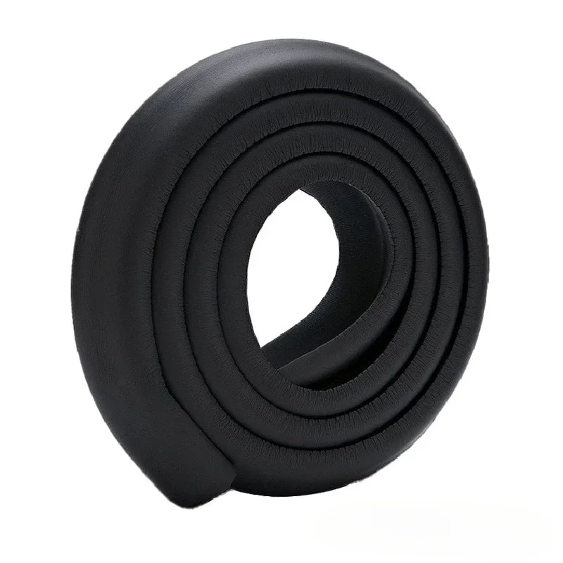 Black soft NBR table edge and corner guard bumper strips rolled into a circular shape