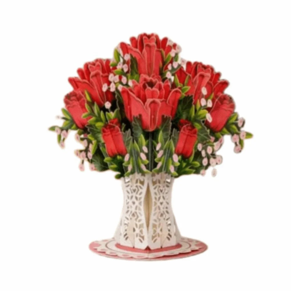 A bouquet of red roses and pink cherry blossoms arranged in a decorative card display.