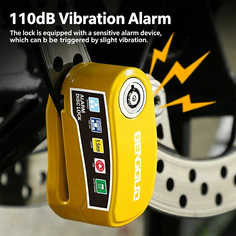 A yellow vibration alarm disc brake lock device is shown attached to a motorcycle component.