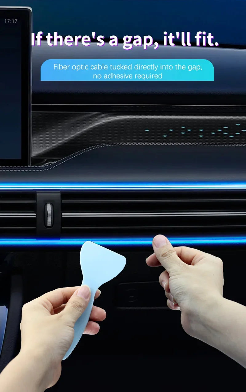 Hands are inserting a small blue plastic piece into a gap in a car interior panel for an RGB music-sync LED light strip.