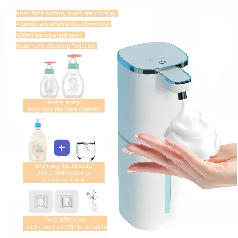 A white touchless automatic soap dispenser with a transparent tank and liquid volume display, shown being used by a hand.