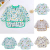 A set of kids waterproof long sleeve art smock and feeding bib featuring various nature-themed patterns.