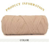 A skein of thick beige polyester blend yarn for knitting and crochet
