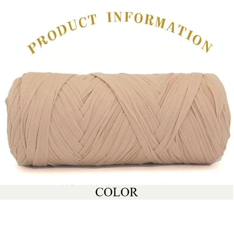 A skein of thick beige polyester blend yarn for knitting and crochet