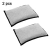 A set of two gray, rectangular cleaning sponges for car interior use.