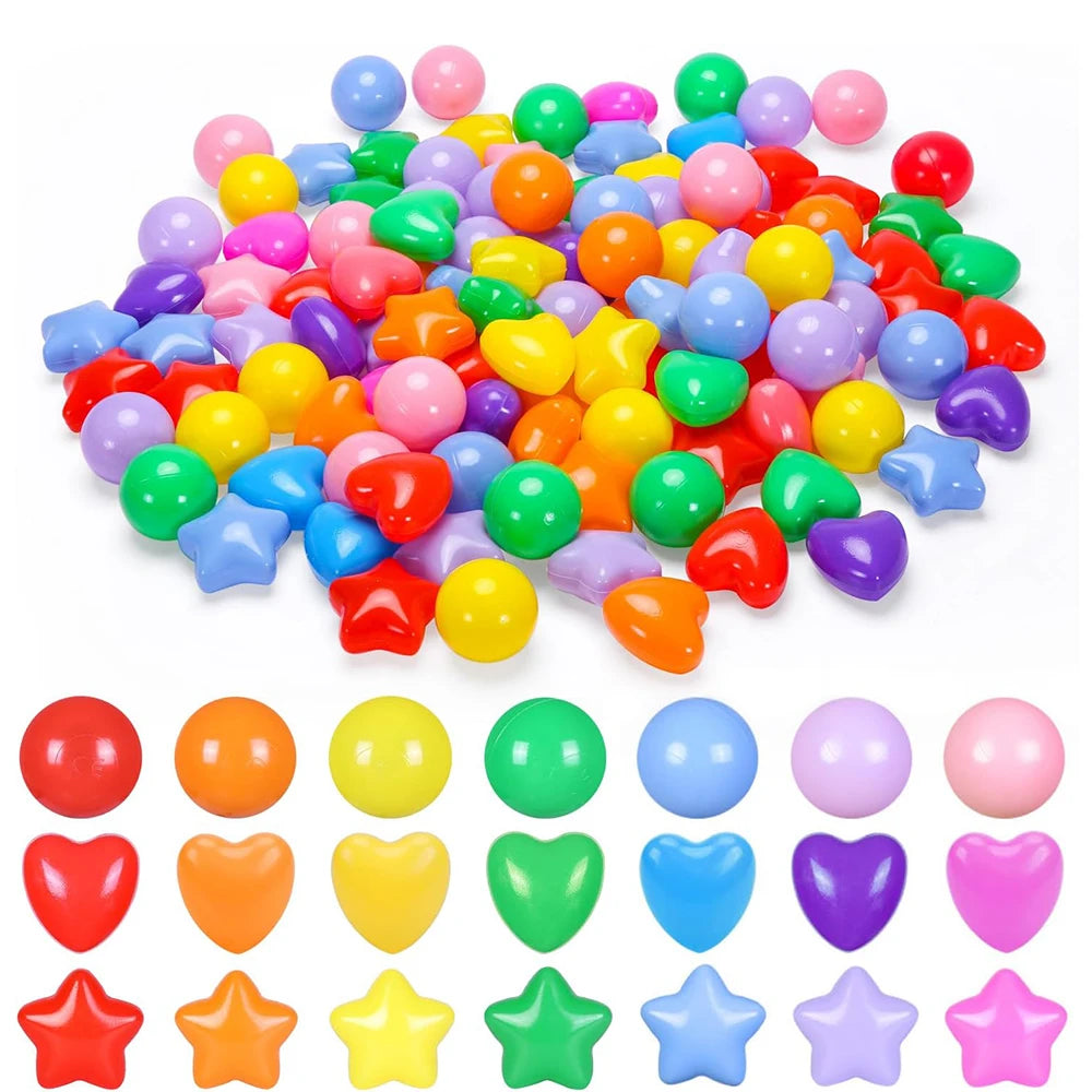 A large pile of colorful non-toxic ball pit balls for kids in various bright colors.