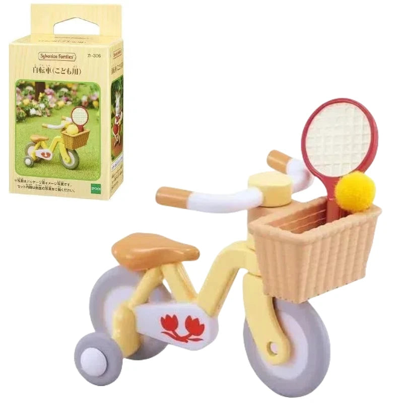 A yellow and white Sylvanian Families toy bicycle with a basket and accessories.