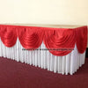 Elegant ice silk table skirt in red and white with matching top swag for a wedding market display