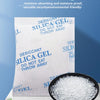 A black bowl filled with white silica gel desiccant pellets next to bags labeled as desiccant silica gel