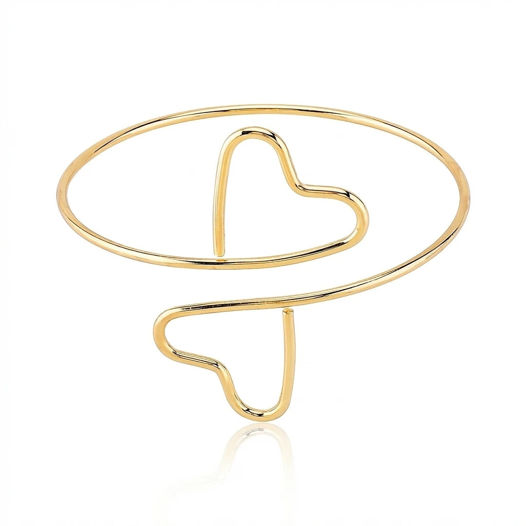 Gold minimalist hollow heart cuff bracelet with a continuous, open-ended design.