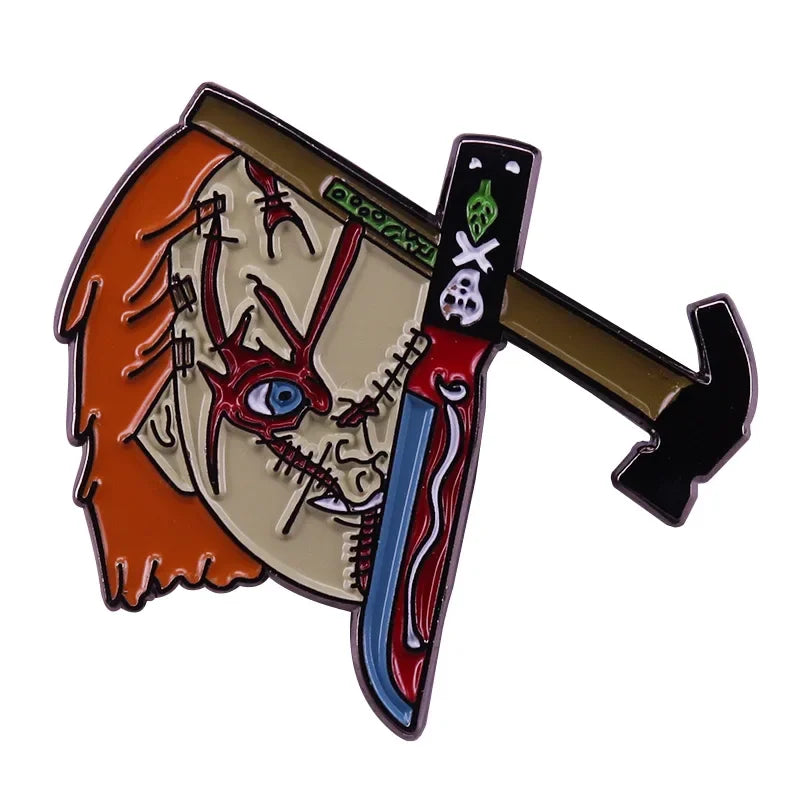 An enamel pin featuring Chucky the horror movie doll with a knife and a skull design.
