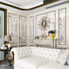 Interior shot of a living room featuring pearlescent pink marble peel and stick wallpaper on the walls.