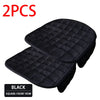 Two black quilted car seat covers with a square-front row design.