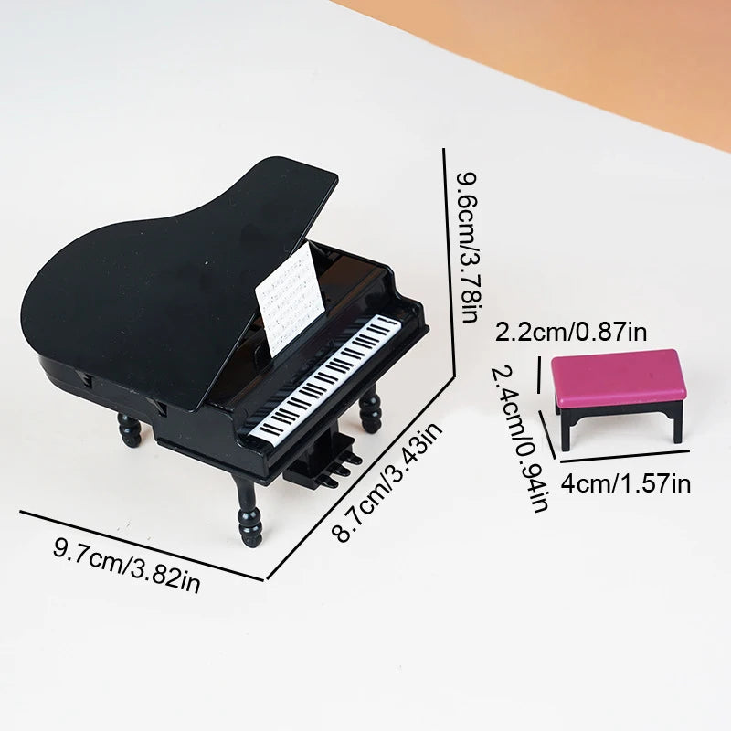 A black 1:12 scale dollhouse piano with a pink bench, shown from the side.