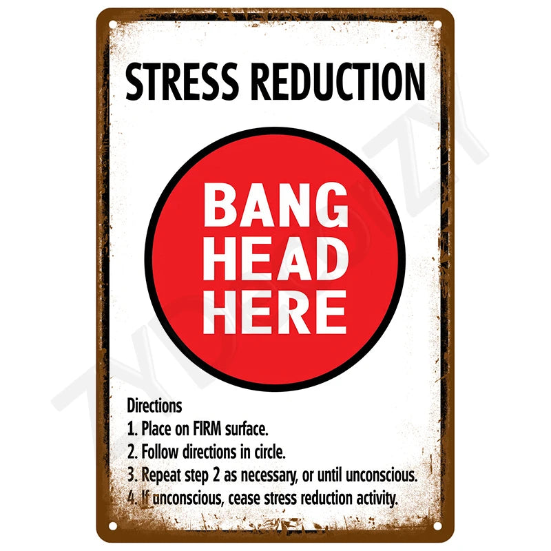 A vintage metal tin sign with text reading STRESS REDUCTION and BANG HEAD HERE on a red circle.