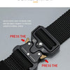 Close-up of a black tactical nylon belt with a metal buckle showing the quick untie feature.
