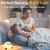 A woman gently holds a baby while using a cute duck night light for baby safety.