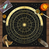 A dark fabric cloth featuring a detailed zodiac wheel with constellations and astrological signs for tarot readings