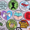A collection of colorful embroidered iron-on patches featuring various designs and text.