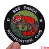 Red Panda appreciation club embroidered patch featuring a red panda illustration on a green background