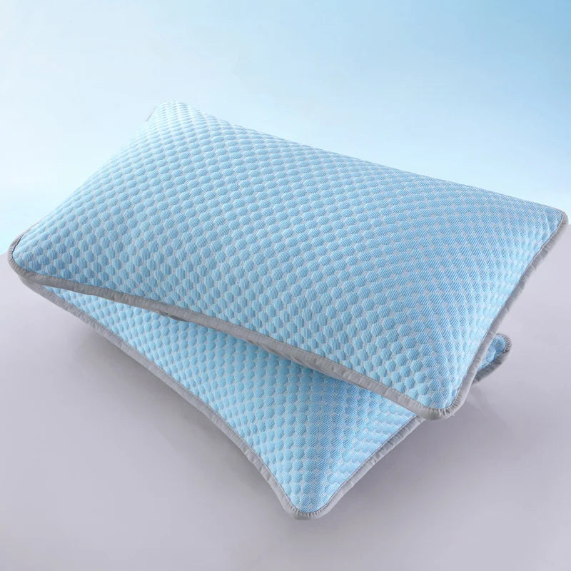 Light blue quilted pillowcase with a gray trim shown from above.