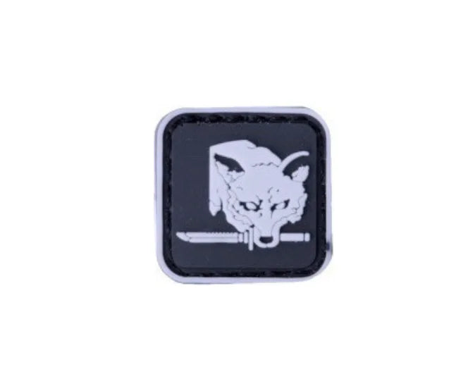 Black embroidered patch featuring a white fox head with a hook and loop backing.