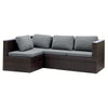 A grey stretch patio sofa cover set consisting of an outdoor sectional sofa and cushions made of brown wicker.