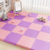 A purple and pink interlocking foam play mat with a grid pattern, featuring toys and a wooden easel.