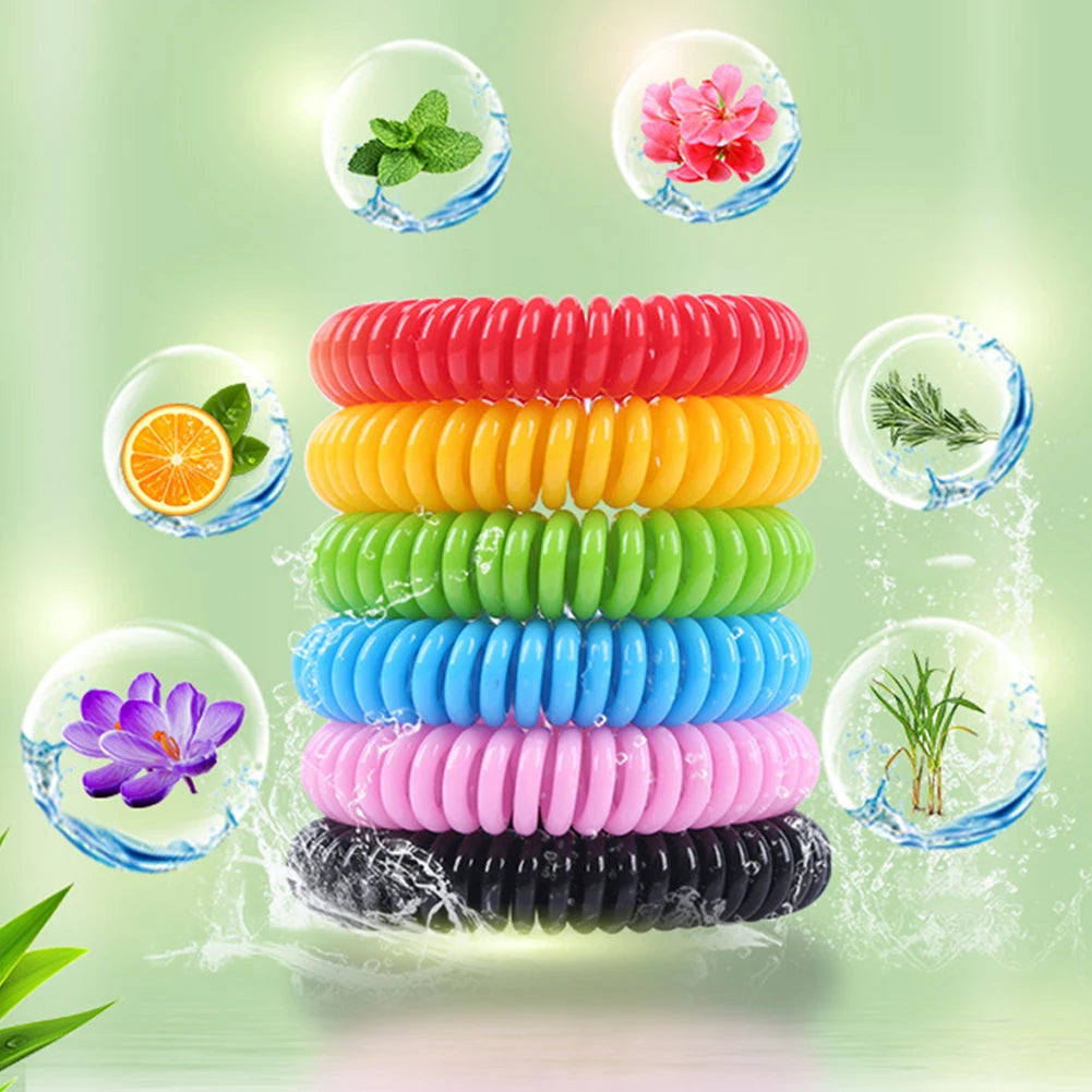 A display of ten colorful bracelets in various shades, including green, yellow, pink, and black, shown floating in water drop