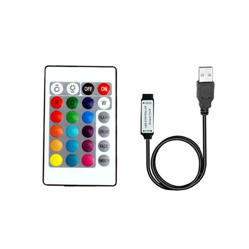 A handheld controller for an RGB LED strip featuring buttons for color selection and power, connected by a cable to a USB por