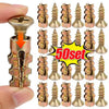 A set of heavy-duty self-tapping wall anchors shown being held by a finger.