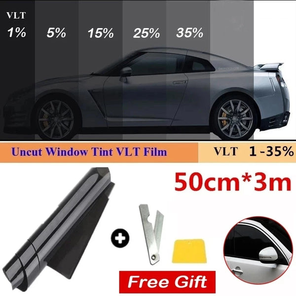 Roll of ULT window tint film with mounting kit and yellow guide for automotive windows