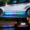 A white car features bright blue and green LED light strips along the lower body and hood.