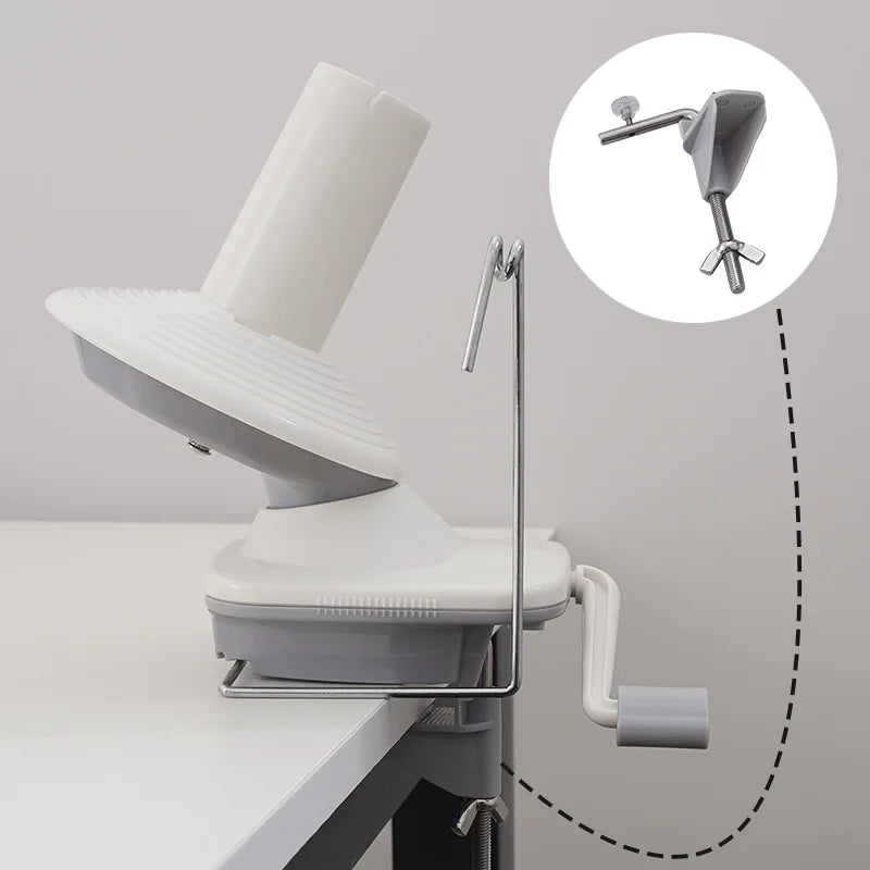 A white compact hand-operated yarn ball winder is shown with a close-up of the winding mechanism.