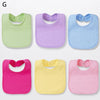 A set of six cotton bandana bibs in various colors including green, purple, blue, pink, and yellow.