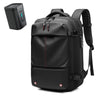 Black expandable travel laptop backpack with vacuum compression features and a separate control unit.