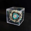 A Valkyrie Volt S4-70V metal spinning top with launcher displayed inside a clear plastic box.