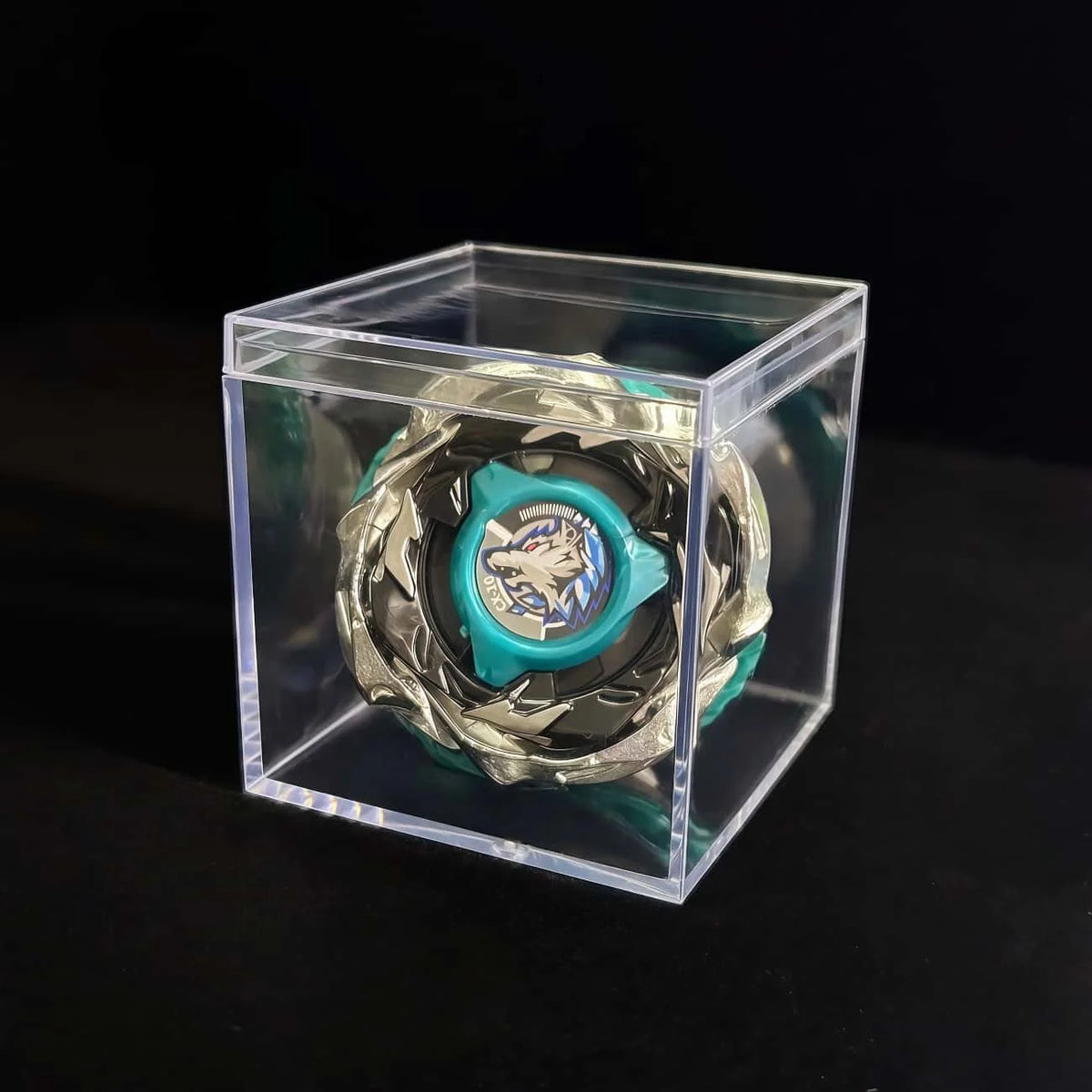 A Valkyrie Volt S4-70V metal spinning top with launcher displayed inside a clear plastic box.