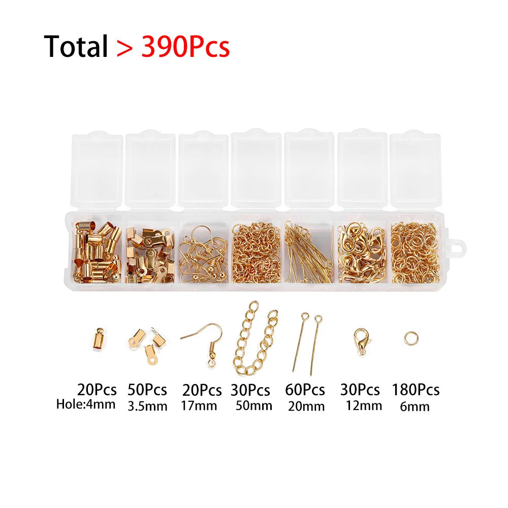 Clear plastic storage box containing various jewelry making components including clasps, jump rings, and crimps
